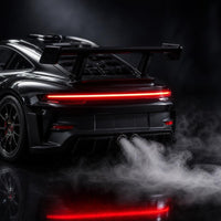 Close-up of the exhaust mist effect and glowing LED tail lights